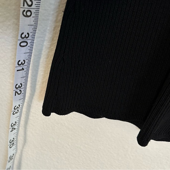 Good American Classic Black Ribbed Midi Dress with intricate ribbing on bust. - Picture 7 of 12